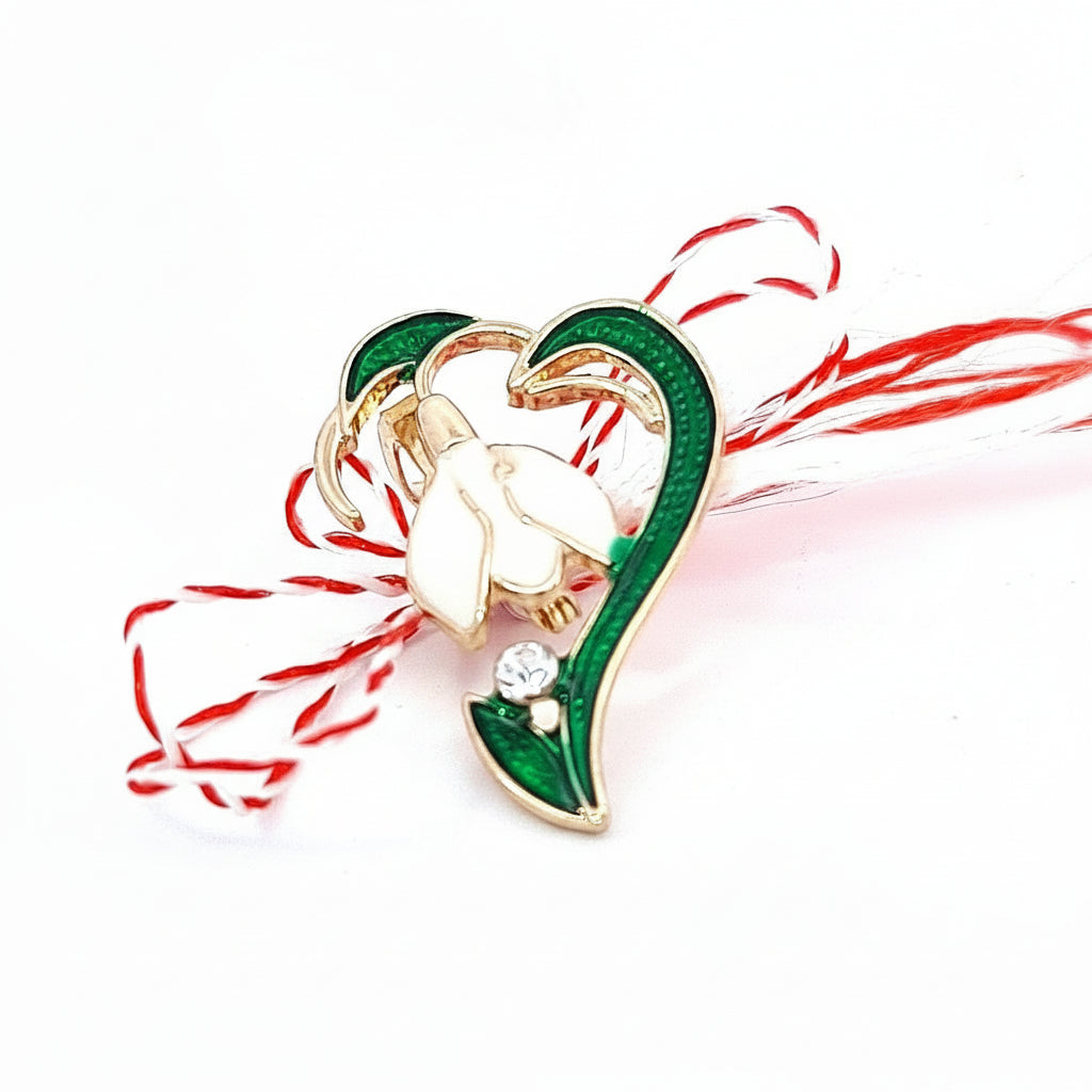 Gold-plated Solitaire Snowdrop Martisor Brooch with enamel and rhinestone detailing, epitomising spring's renewal.