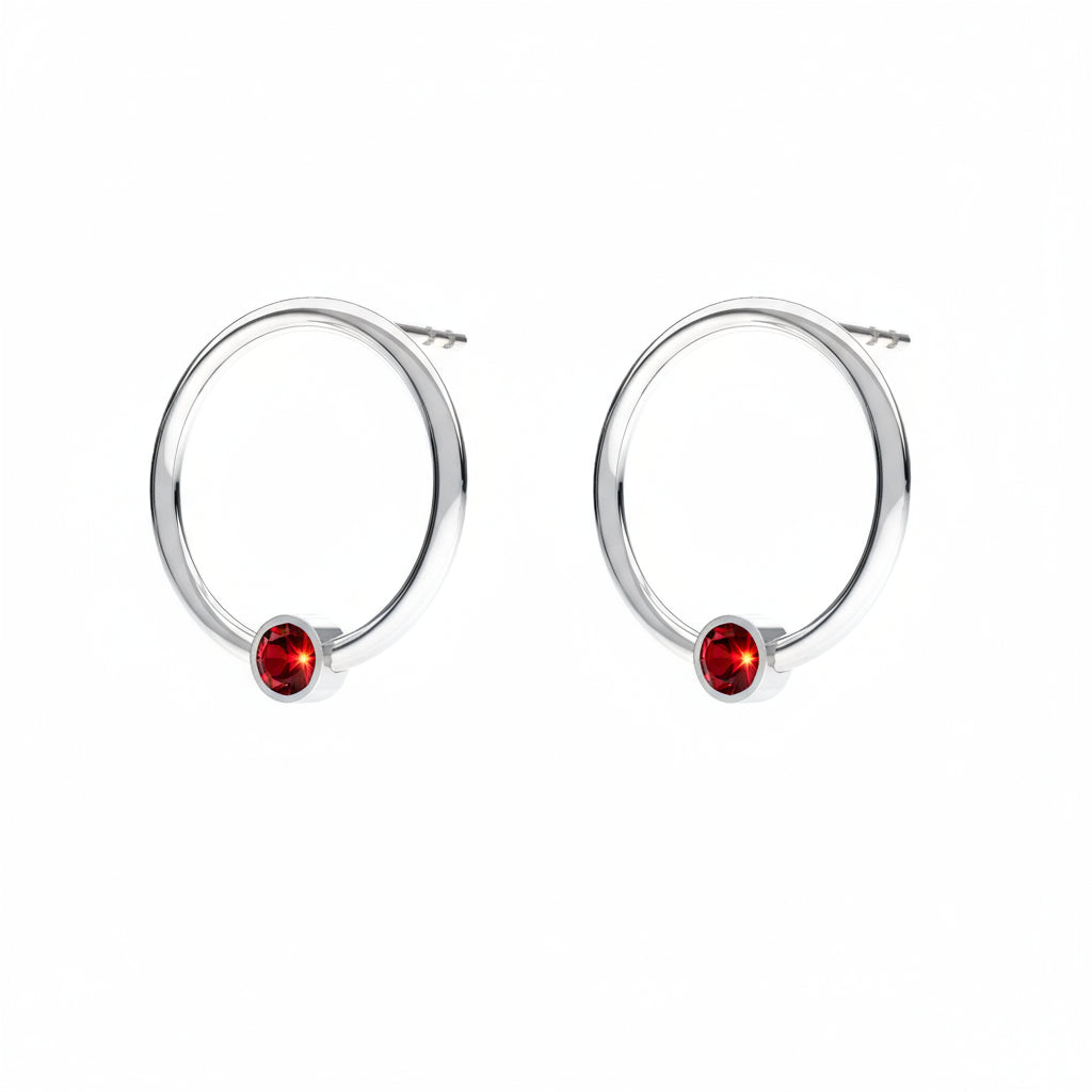 January birthstone circle earrings in sterling silver with red Garnet crystal, handcrafted by Magpie Gems Ireland