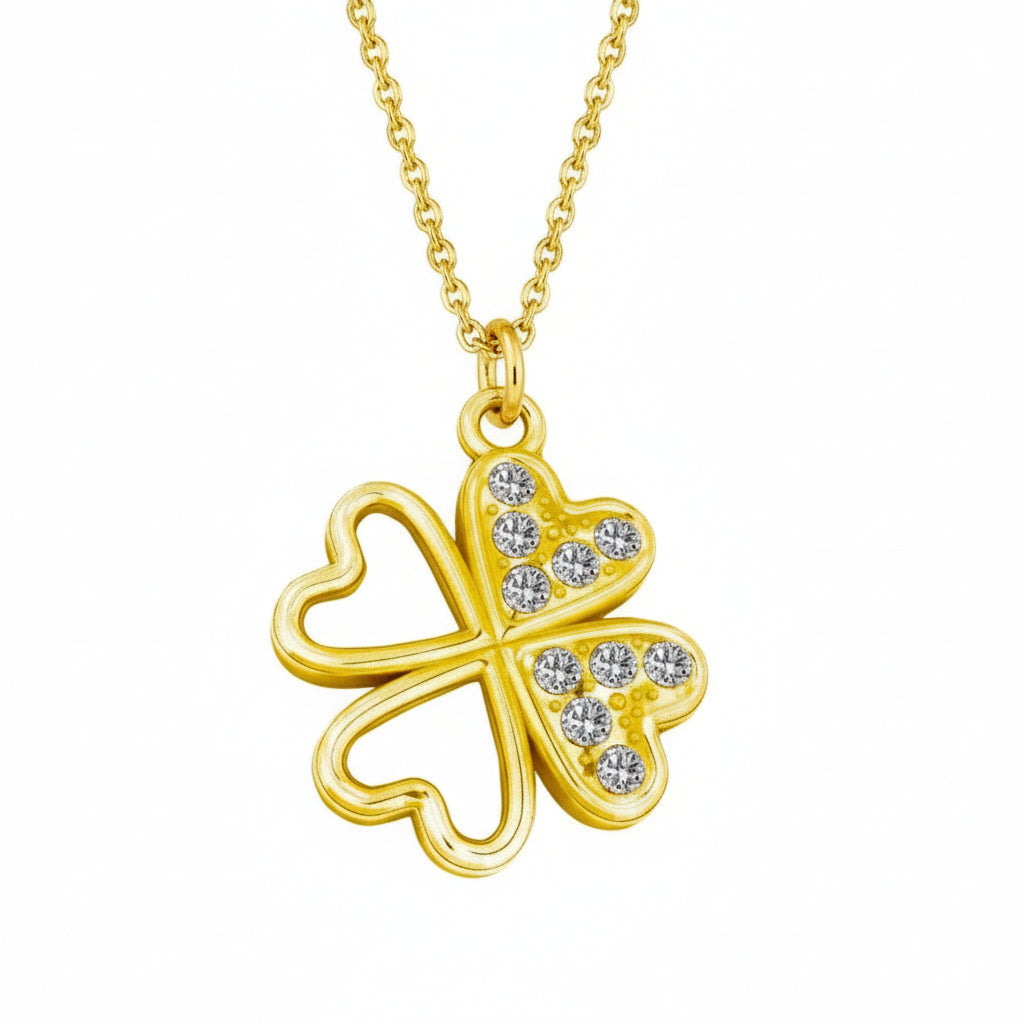 24k gold-plated four-leaf clover pendant necklace with heart-shaped leaves and sparkling Austrian crystals by Magpie Gems, handmade in Ireland.