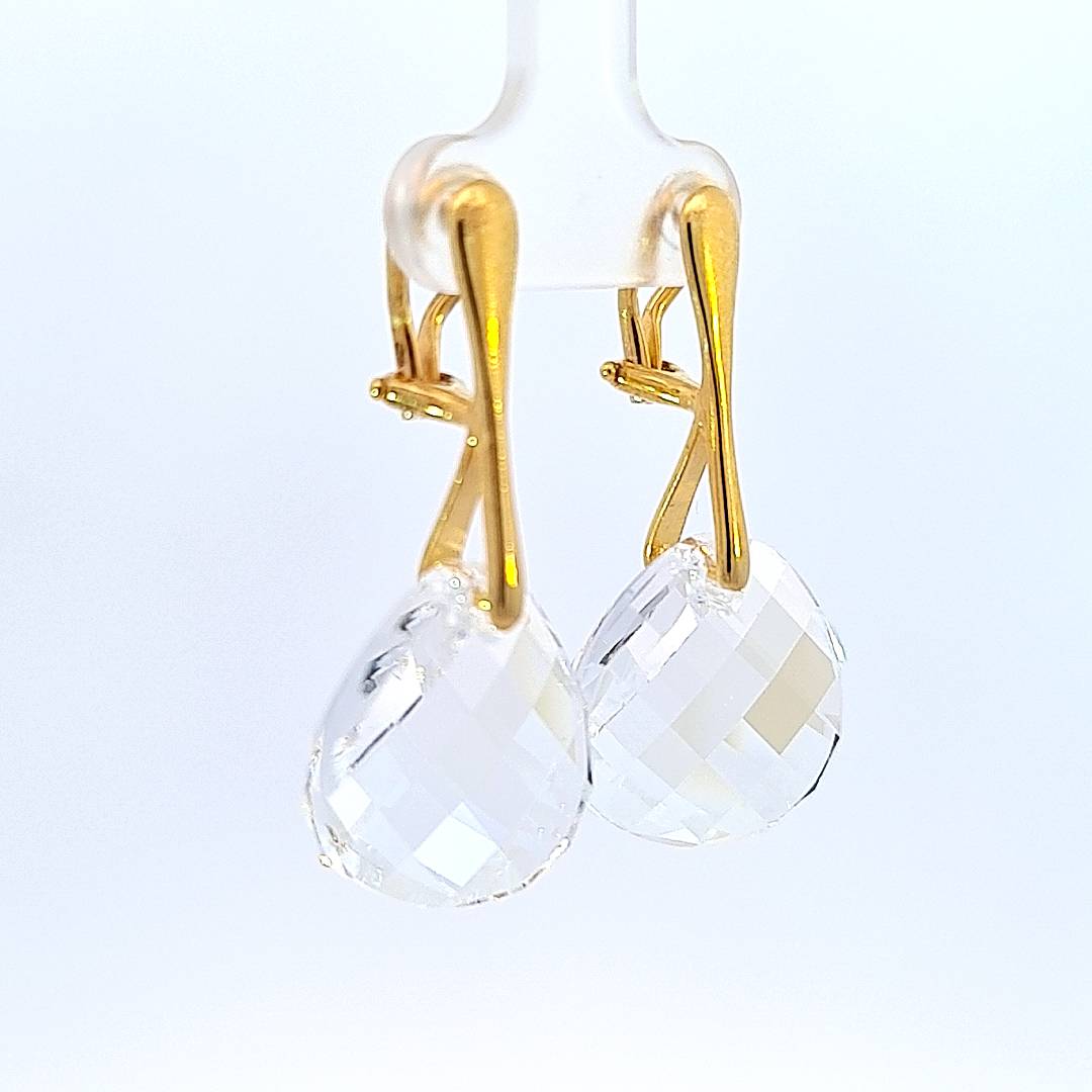 Elegant side view of Celestial Gleam Gold Clip-On Earrings showing the brilliance of the Moonlight crystals.