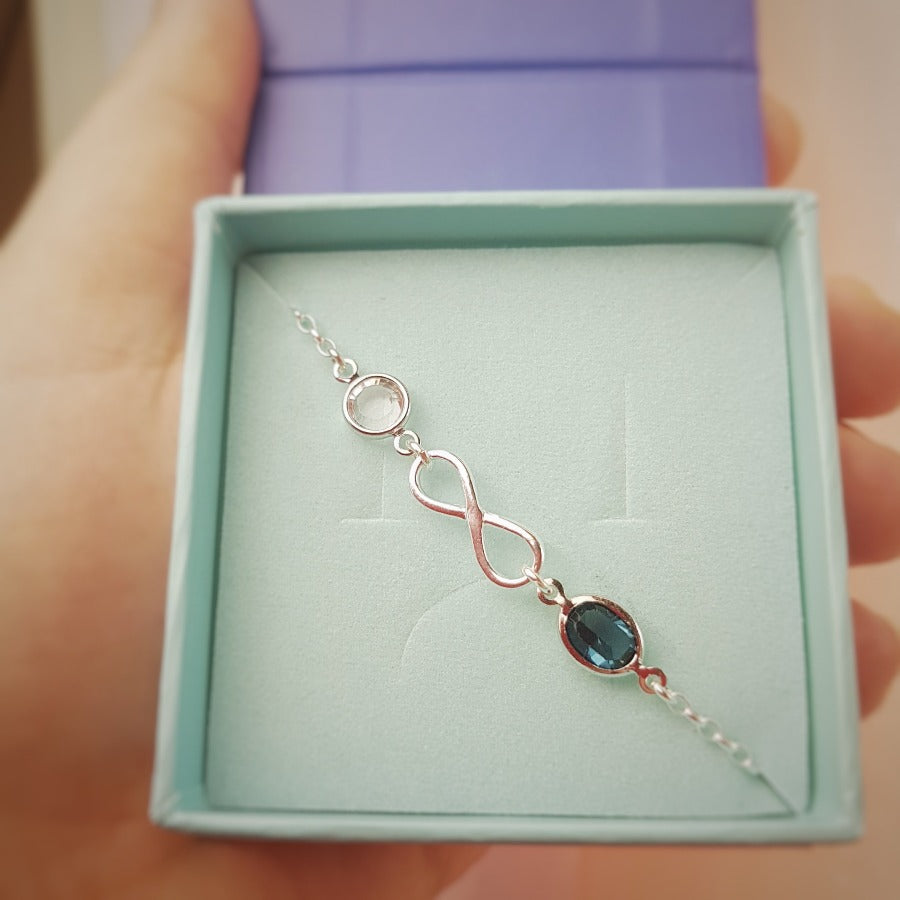 SIver infinity Bracelet with 2 crystal birthstones in a gift box from Ireland