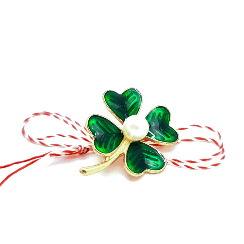 4 leaf clover with white pearl in the middle brooch with white an red martisor bow, made in Ireland