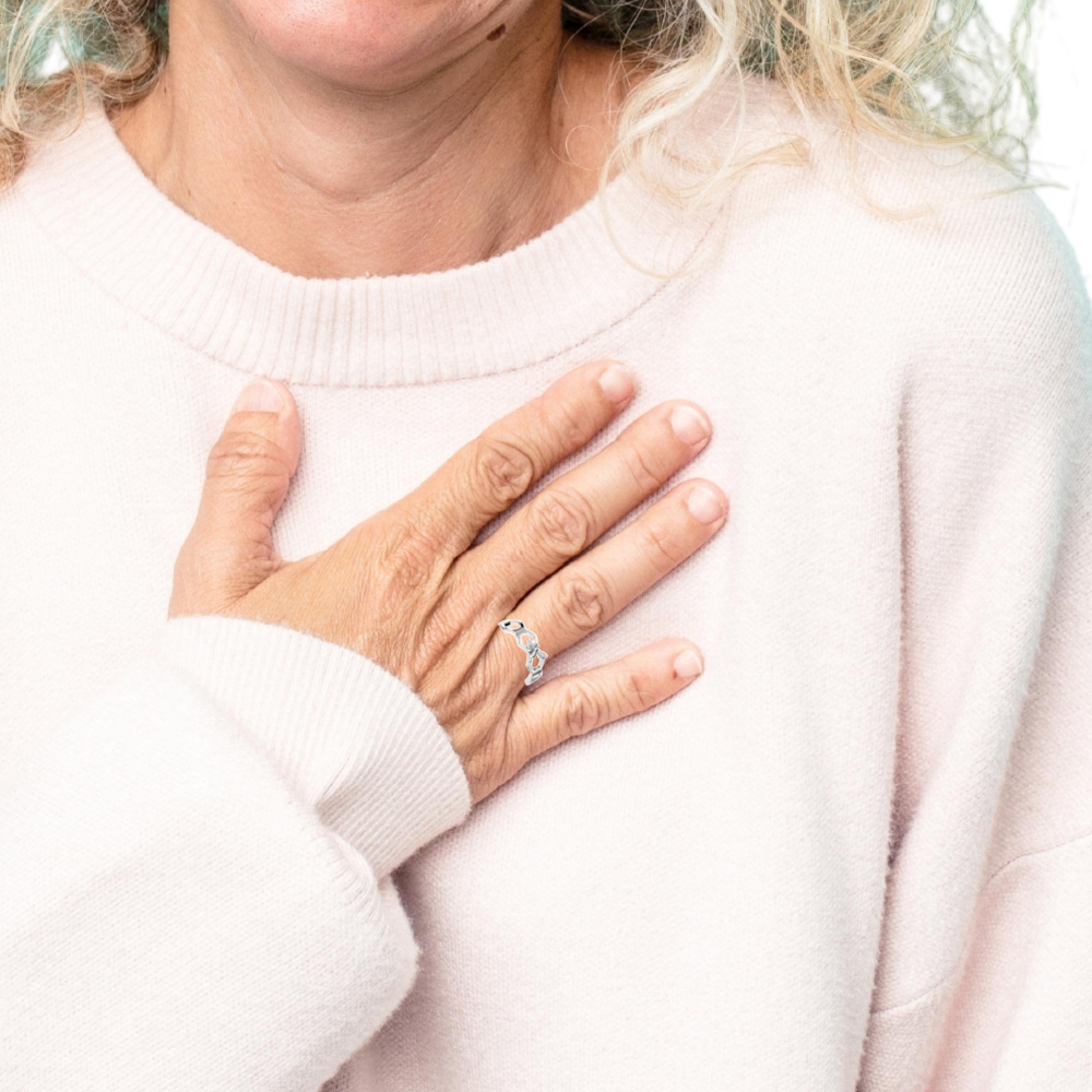 Women wearing a Honeycomb with Bee Sterling Silver Ring, by Magpie Gems Jewellery Ireland