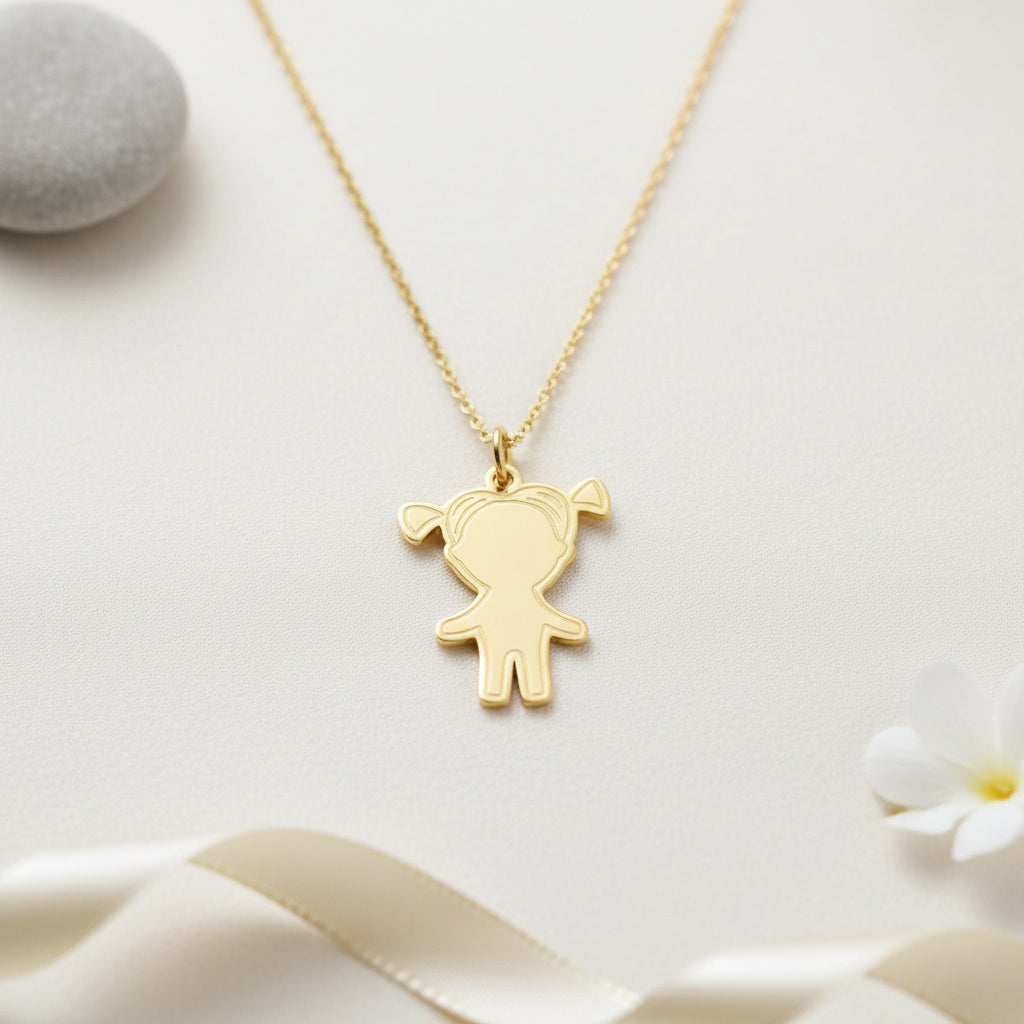 Gold plated sterling silver necklace featuring a girl silhouette pendant showcased on a minimalist wooden table display for a modern look.