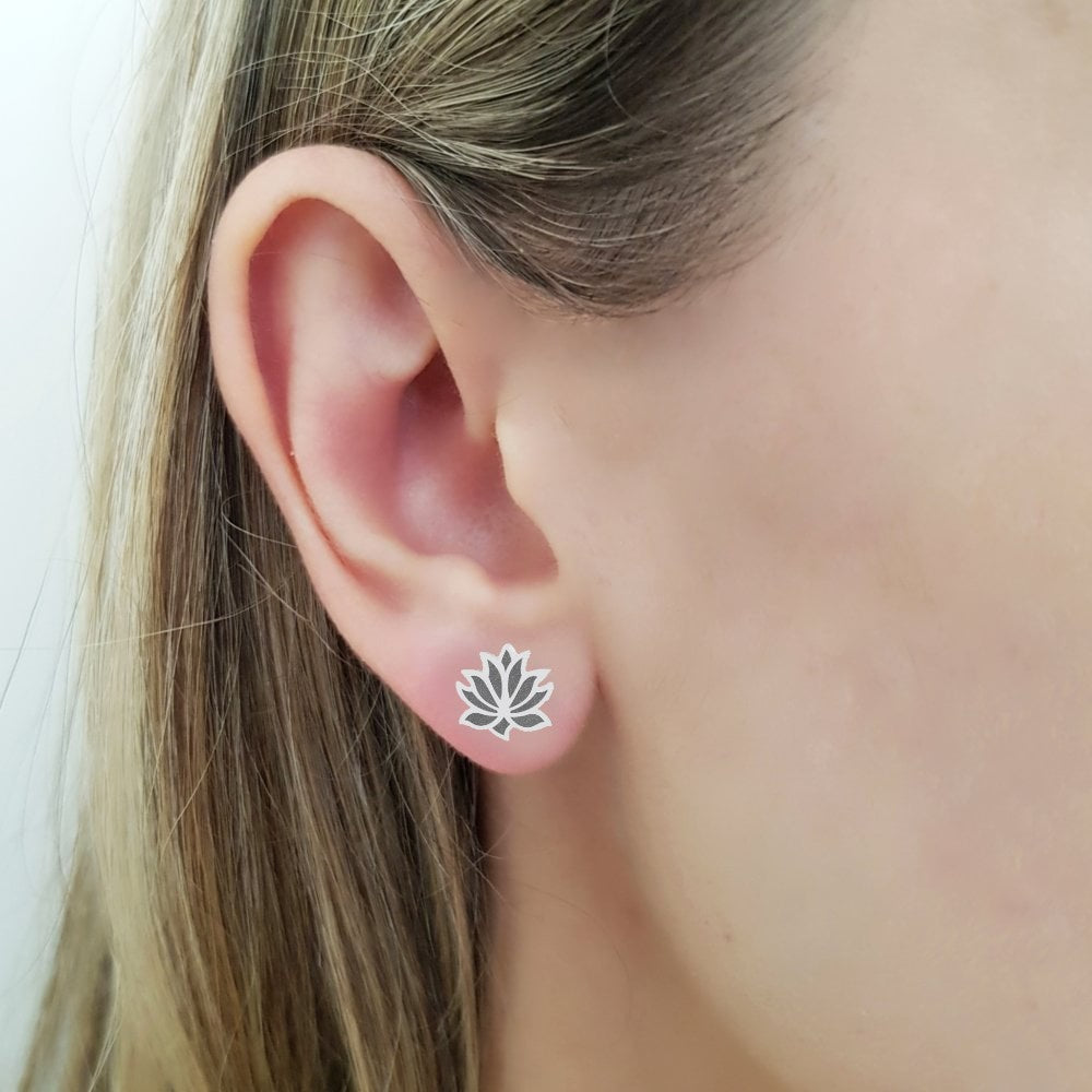 Woman wearing Lotus Blossom Silver Stud Earrings made in Ireland