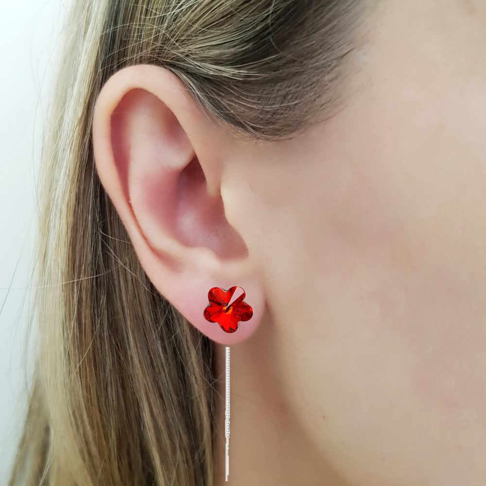 Model Wearing Flower Crystal Silver Threader Earrings in Siam Red, made by Magpie Gems in Ireland