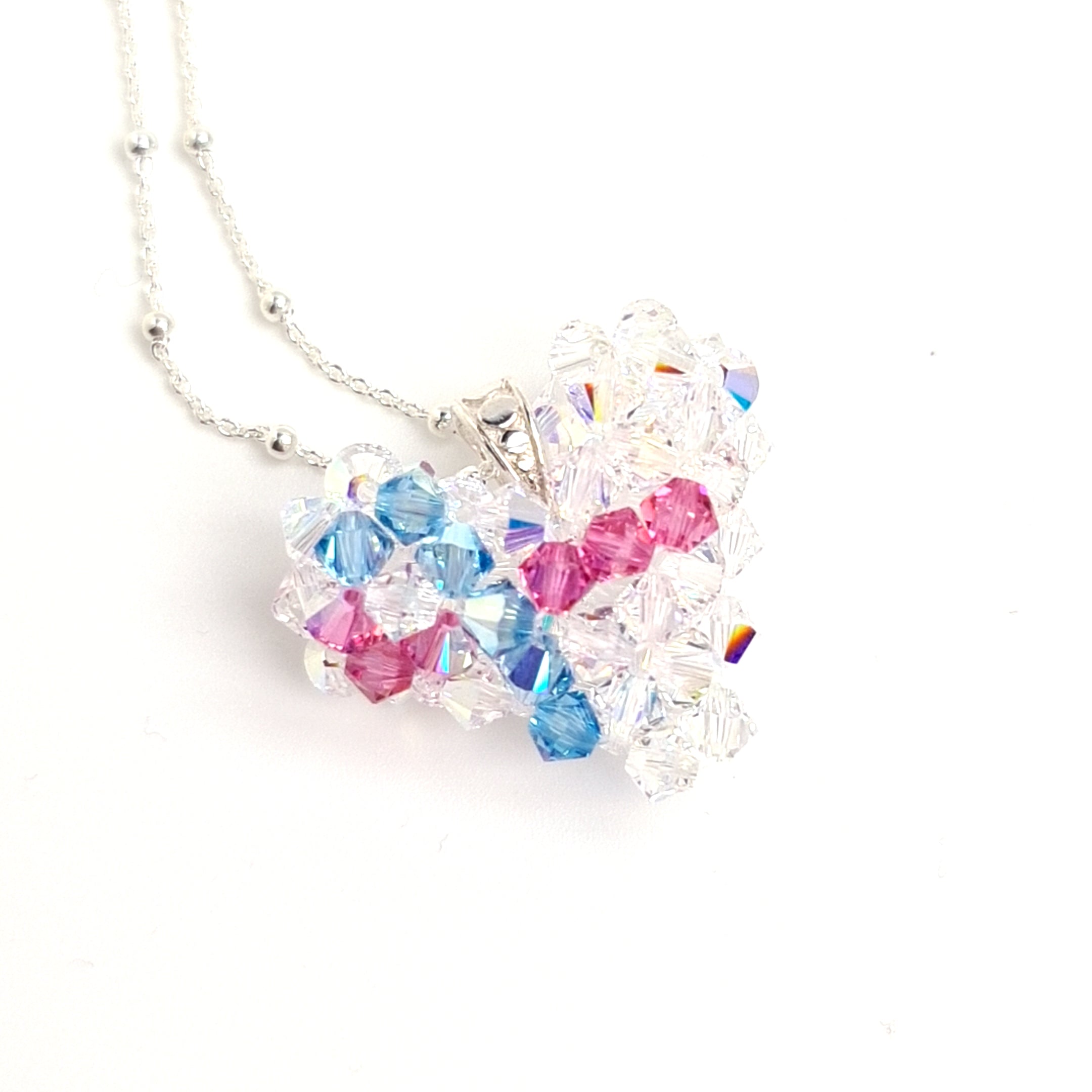 Stillbirth Awareness Ribbon of Hope Heart Silver Necklace with a handmade puffy heart pendant made with 72 crystals in Crystal Clear, pink and blue, a symbol of Baby or Child Loss, Miscarriage in Ireland by Magpie Gems. This is a perfect memorial gift for someone that is grieving a child loss.