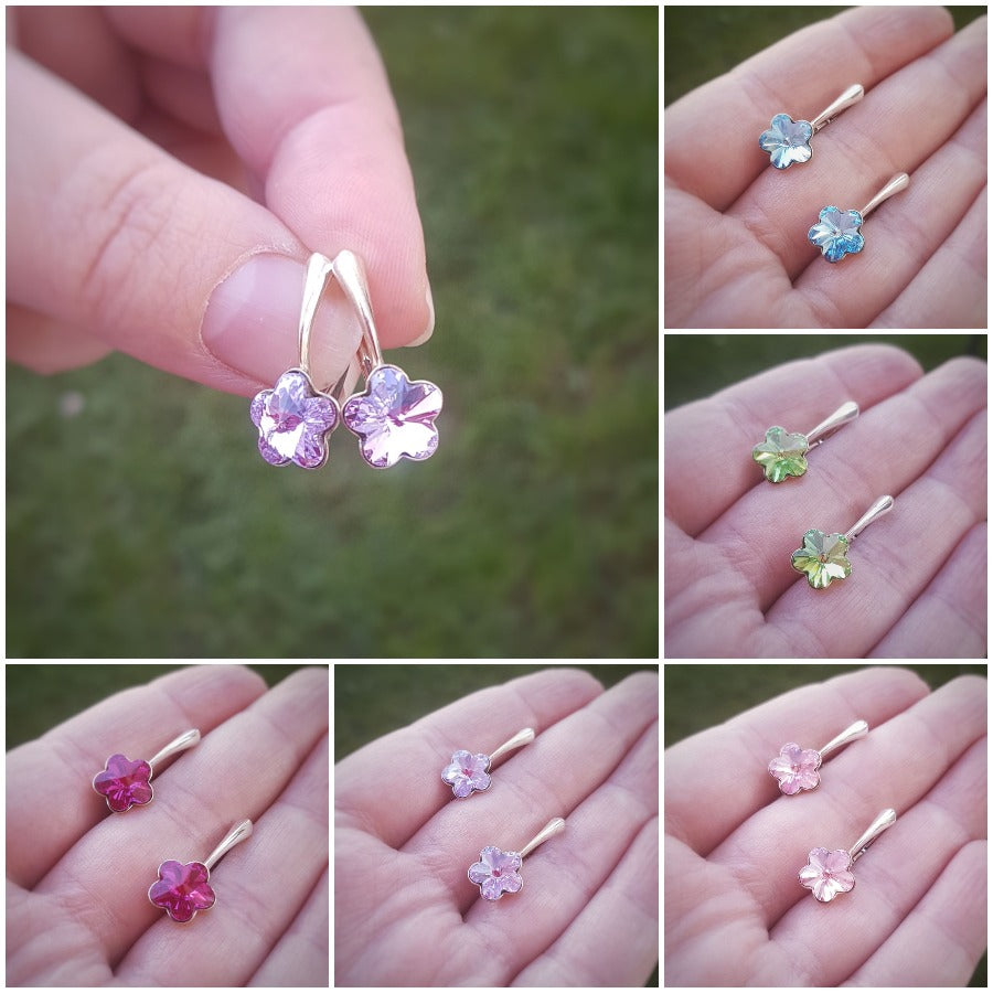 A collection of Silver Drop Earrings with Flower Crystals in a colour of choice and nickel free (Hypoallergenic) sterling silver lever back for secure fitting. Handmade in Ireland by Magpie Gems, with crystals from Austria