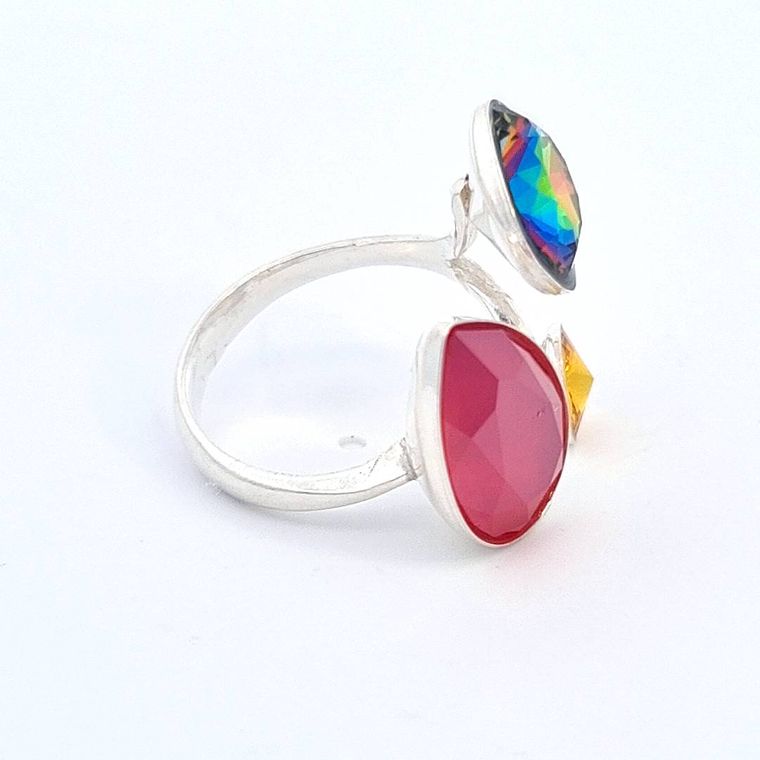 Side view of the Spectrum Splendour Adjustable Ring by Magpie Gems, highlighting the detailed setting and craftsmanship of the multi-coloured crystals.