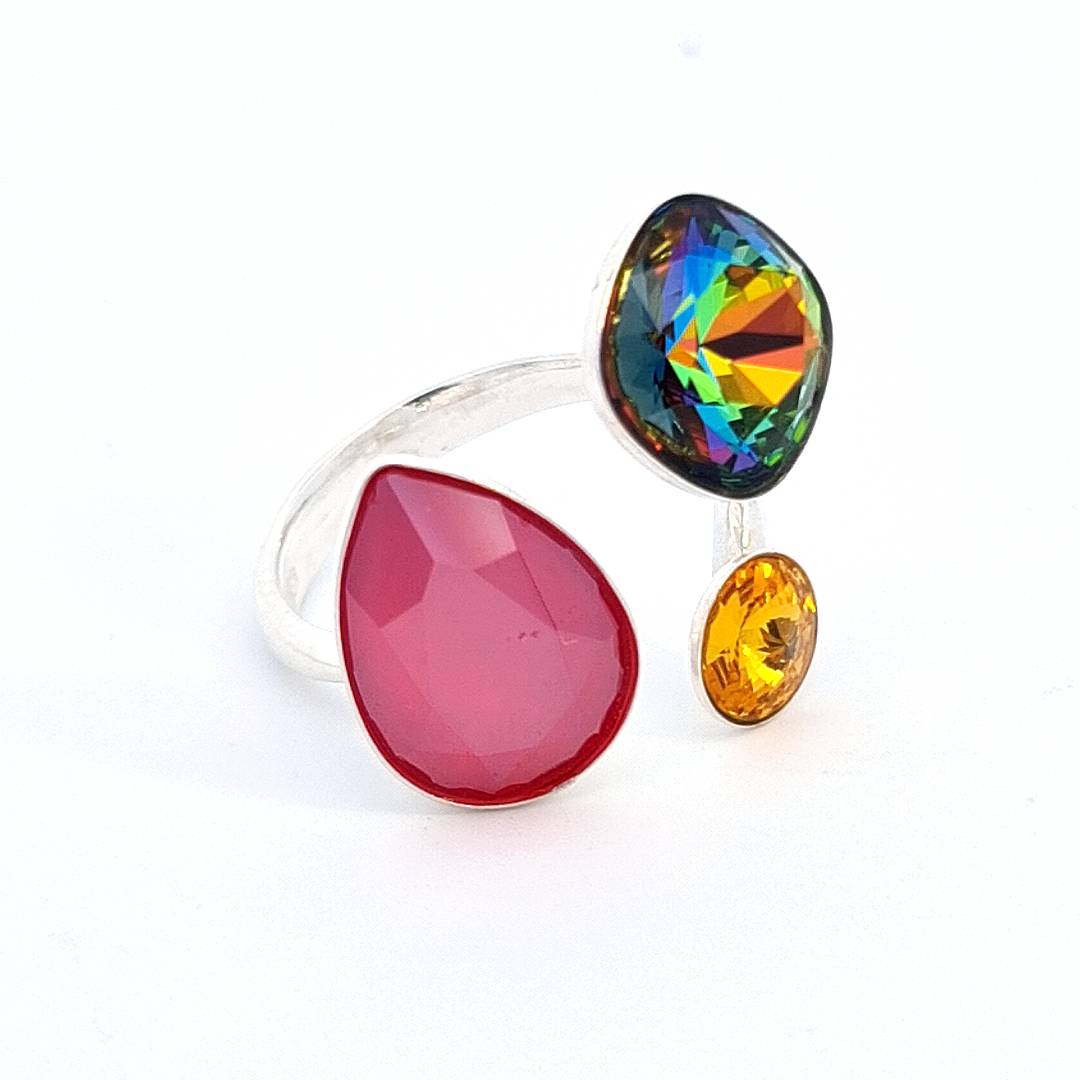 Side view of the Spectrum Splendour Adjustable Ring by Magpie Gems, highlighting the detailed setting and craftsmanship of the multi-coloured crystals.