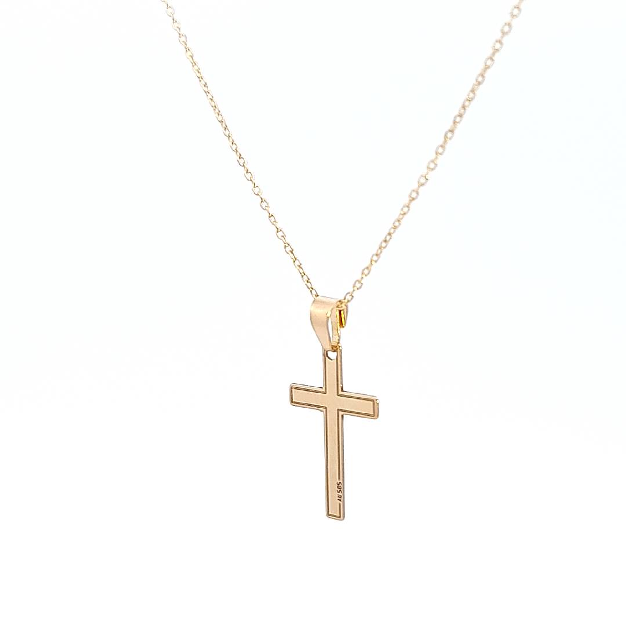 Faith's 14k Gold Cross Necklace - Alternate side view showcasing the reflective sheen on the 14k gold cross surface