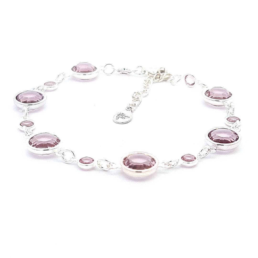 Sophisticated June birthstone sterling silver bracelet, featuring light amethyst crystals that exude a gentle lavender hue, embodying wisdom and calm, handcrafted with care in Ireland.