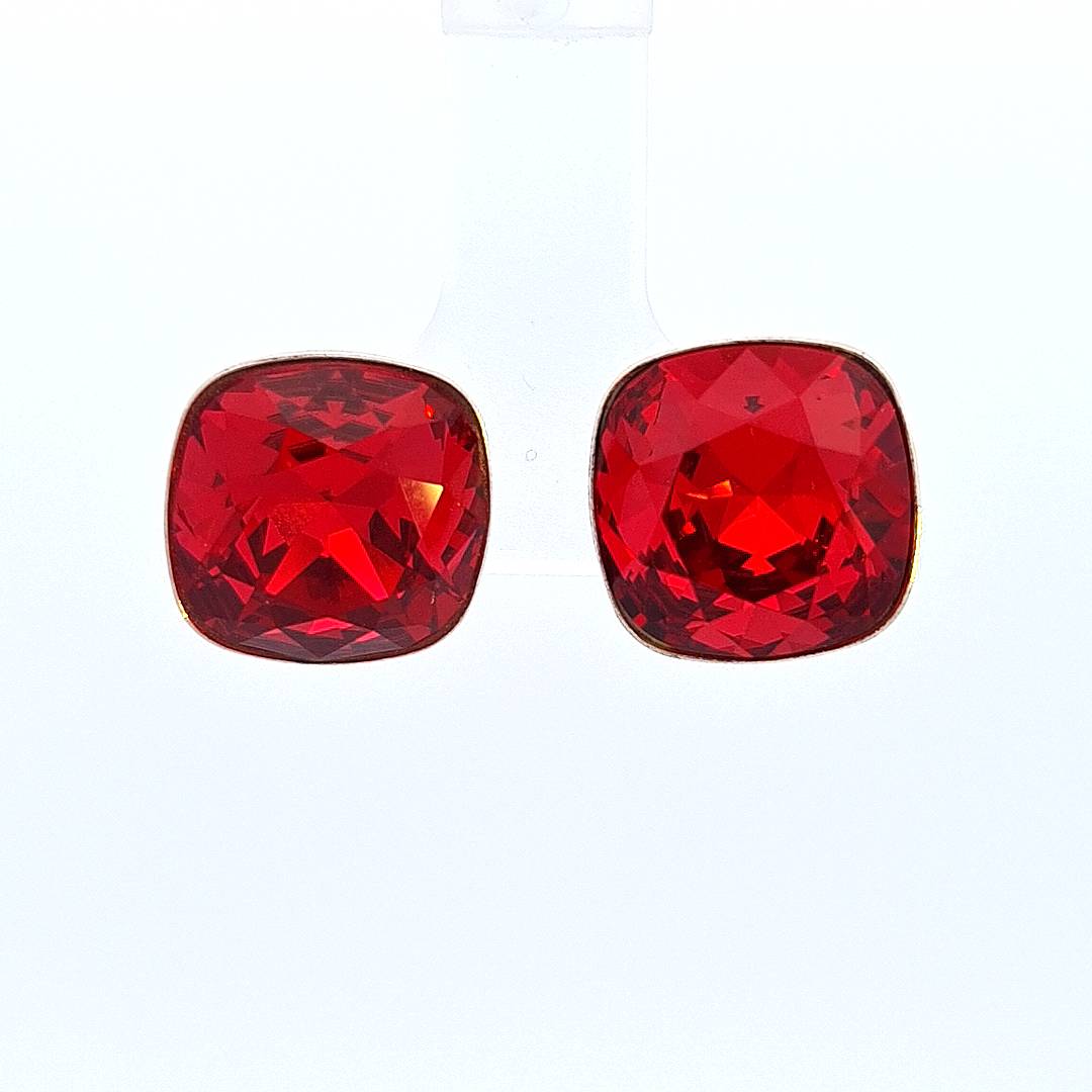 Silver Cushion Stud Earrings with Light Siam square Austrian crystal, a fiery red symbolising passion, courage, and the strength within every woman.