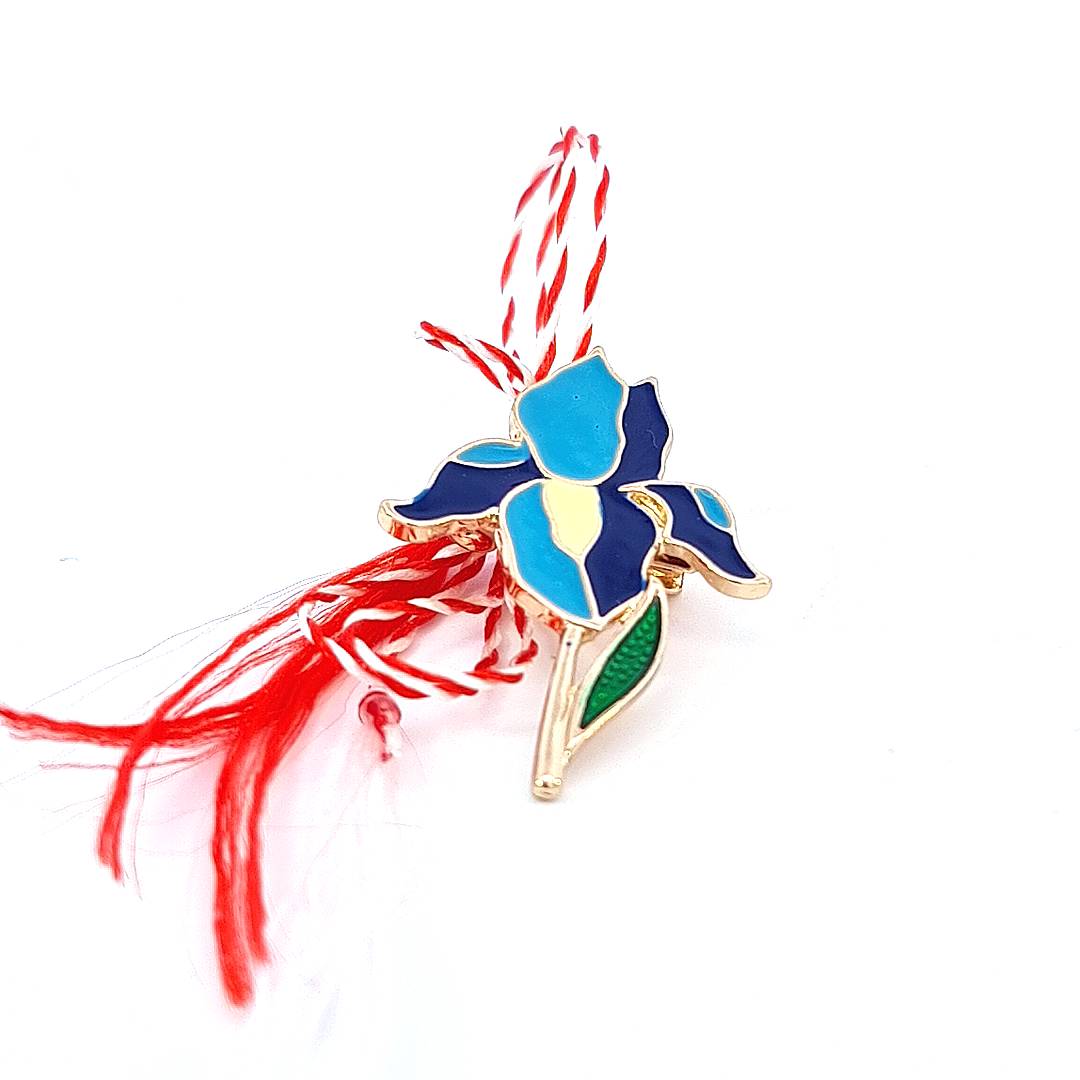 Vibrant blue iris Martisor brooch with gold plating, symbolising the joy of spring.