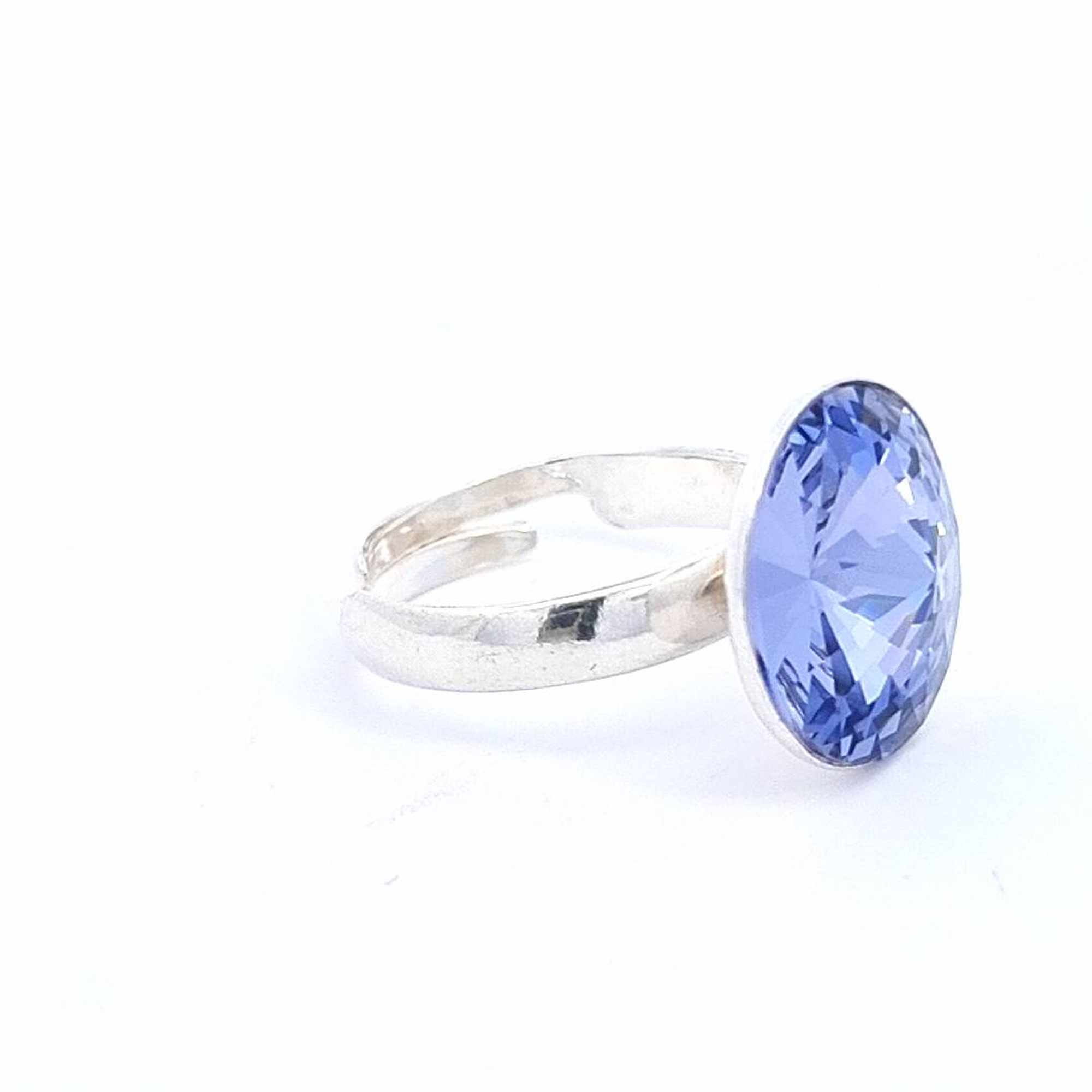 Side View of Spectra Solitaire Ring with Reflective Rivoli Crystal  in Tanzanite Purple - Magpie Gems Ireland