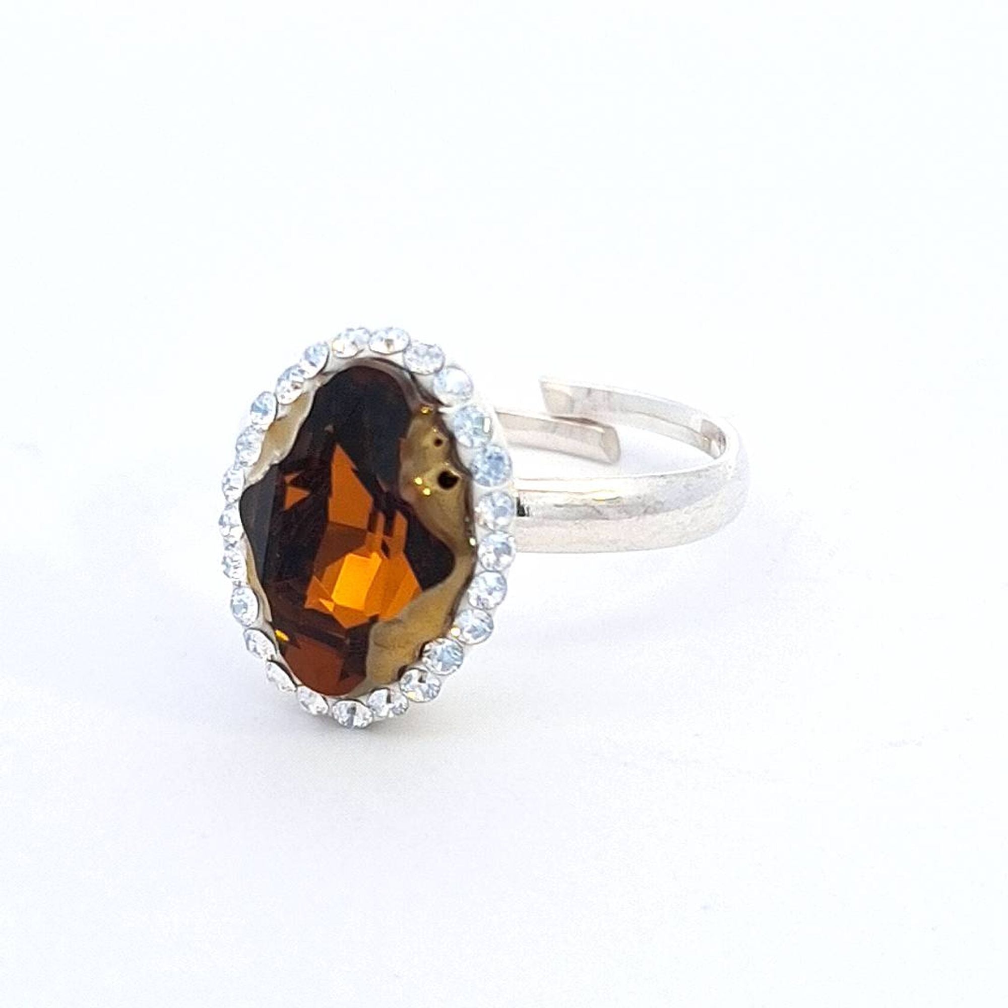 Magpie Gems' Tribe Crystal Amber Aura Halo Ring in Sterling Silver, showcasing an Austrian Tribe crystal., side view