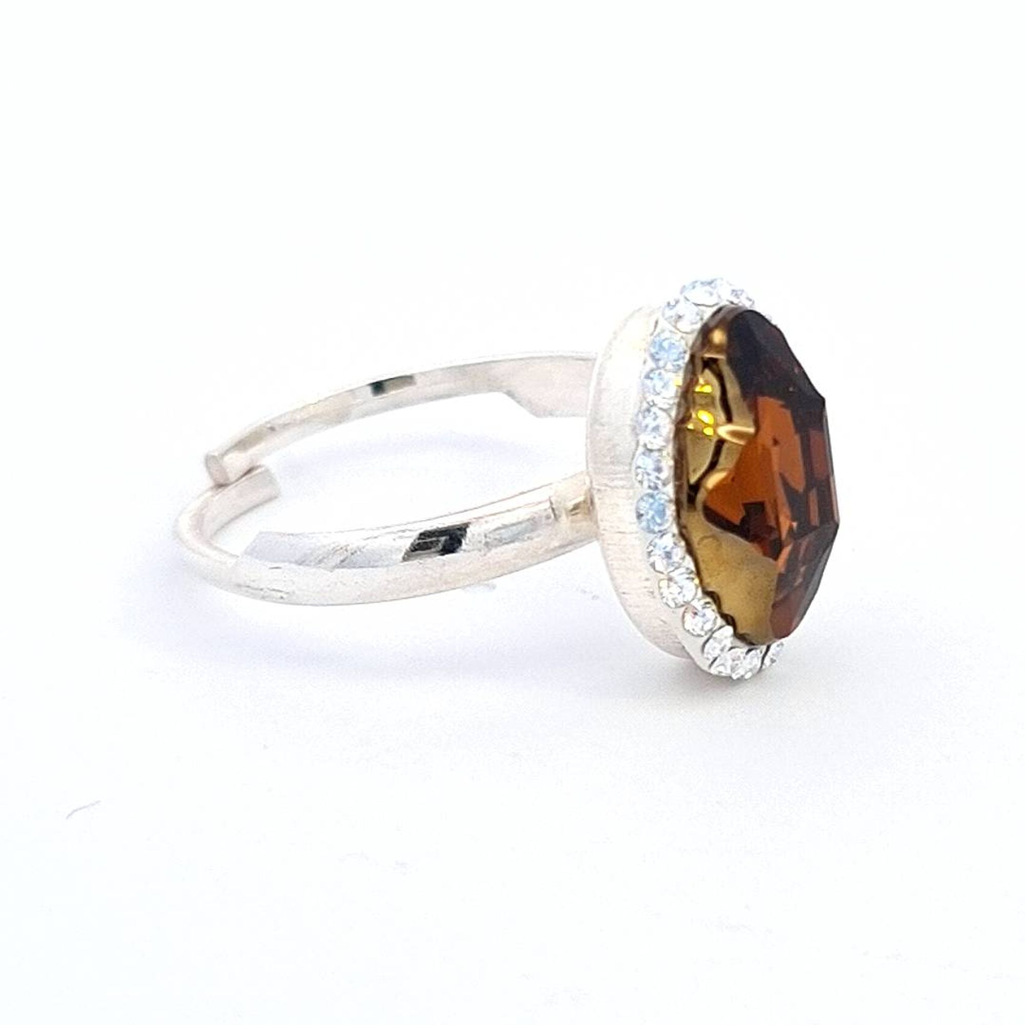 Magpie Gems' Tribe Crystal Amber Aura Halo Ring in Sterling Silver, showcasing an Austrian Tribe crystal., side view.