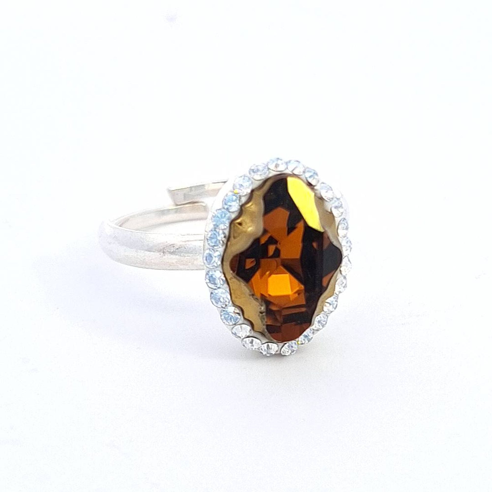 Magpie Gems' Tribe Crystal Amber Aura Halo Ring in Sterling Silver, showcasing an Austrian Tribe crystal. This ring is handmade in Ireland 