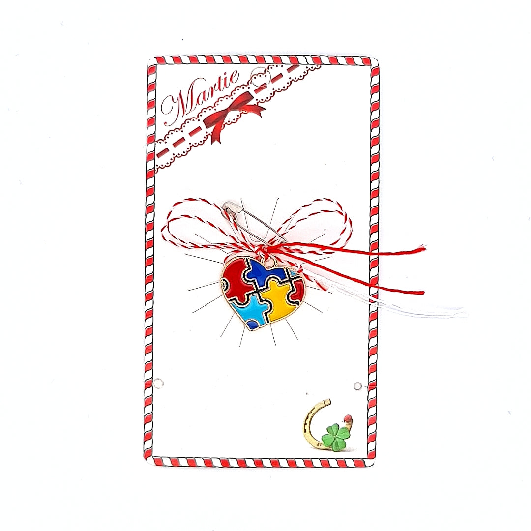 Love You to Pieces Martisor heart style, colorful jigsaw Martisor, red and white ribbon, safety pin from Ireland, placed on a card