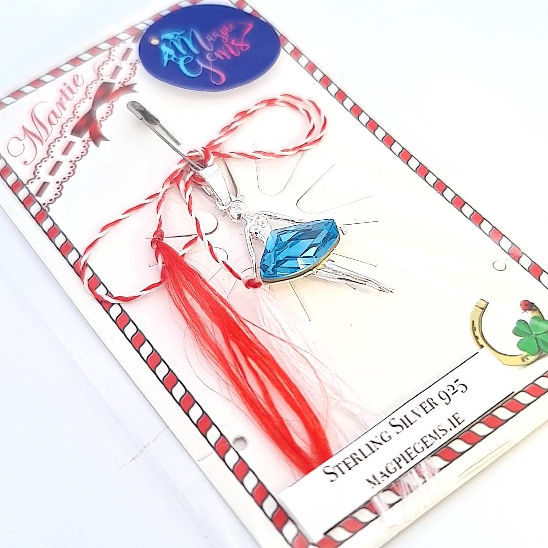 Packaged Graceful Rhapsody Ballerina Mărțișor Pendant, ready for gifting, with a vibrant red and white string and a Romanian or English storytelling card.
