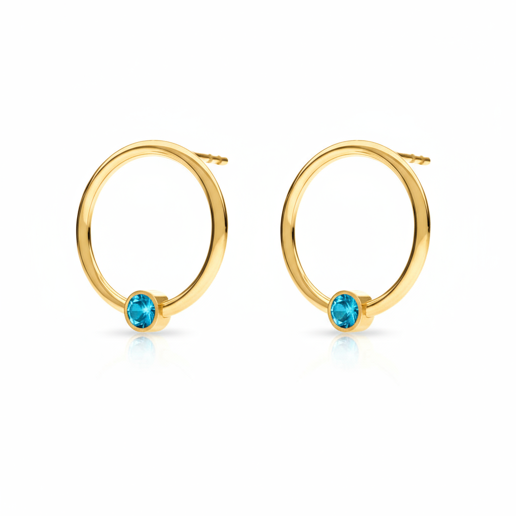 December birthstone circle earrings in 24k gold-plated sterling silver with turquoise blue crystal, handcrafted by Magpie Gems Ireland