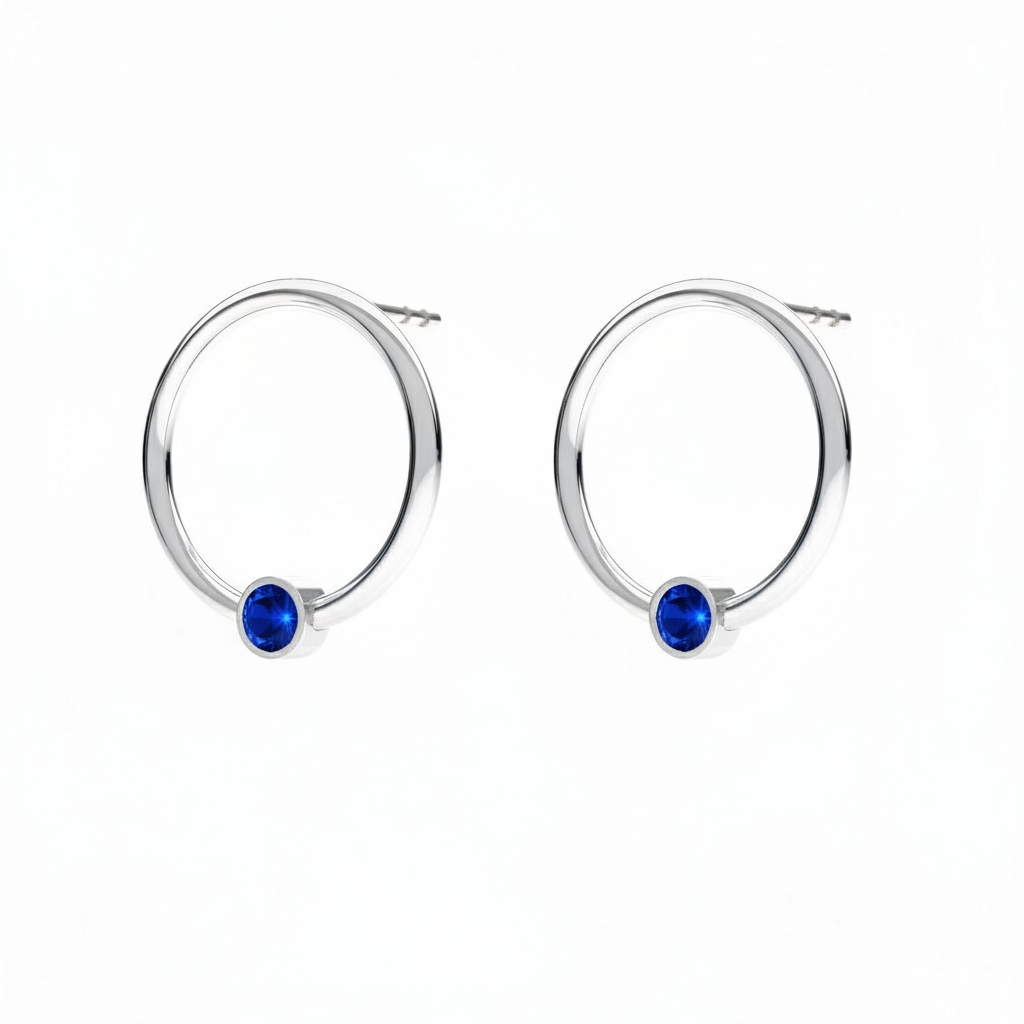 September birthstone circle earrings in sterling silver with deep blue Sapphire crystal, handcrafted by Magpie Gems Ireland