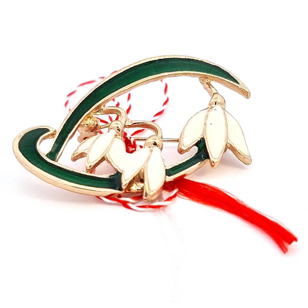 Large Martisor brooch by Magpie Gems featuring enamel snowdrops and a red and white string on an alloy base.