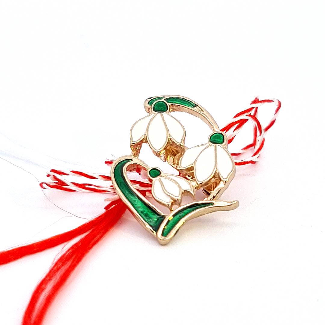 Alloy and enamel Martisor brooch with snowdrop design and traditional red and white string by Magpie Gems.