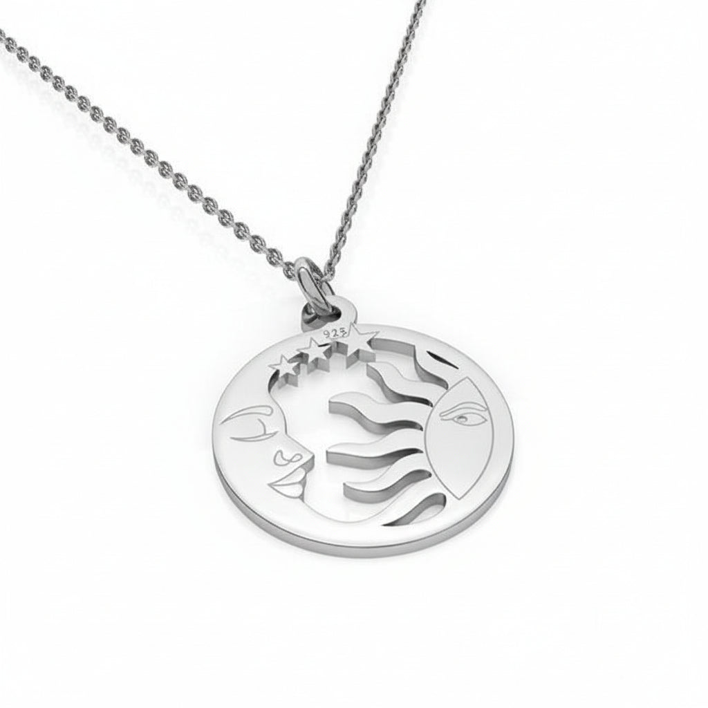 Sterling silver 'Celestial Harmony' necklace with a round pendant depicting a detailed sun and moon face in relief, symbolizing balance and unity, on a fine silver chain.