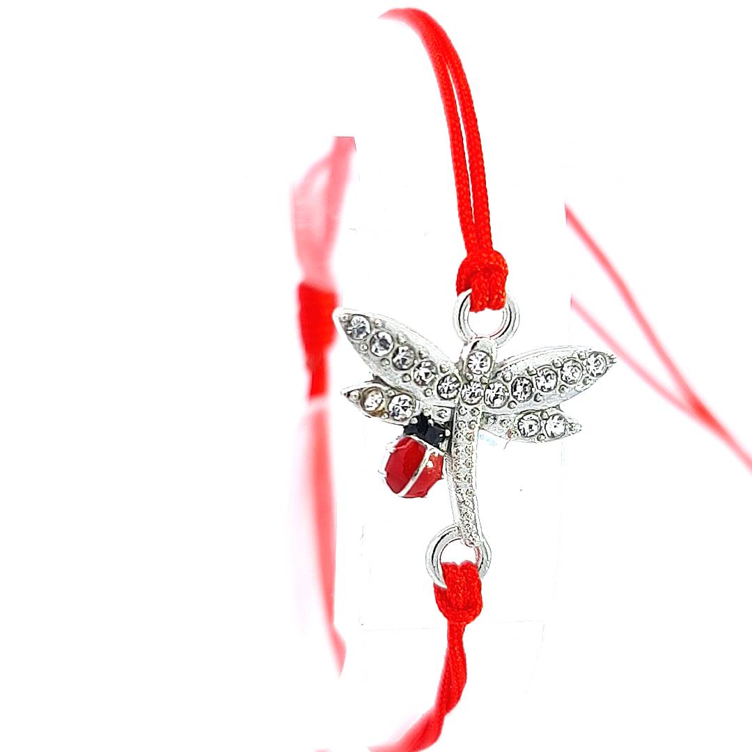The 'Whispers of Spring' Martisor Bracelet elegantly displayed on a stand, highlighting the silver dragonfly with crystals and ladybird detail, against a clean white backdrop.
