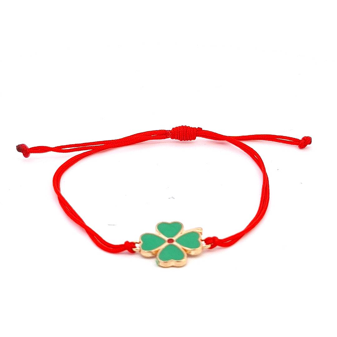 Chic 'Clover Wishes' Martisor Bracelet with a gold-plated four-leaf clover charm on an adjustable red macramé cord, ready for gifting