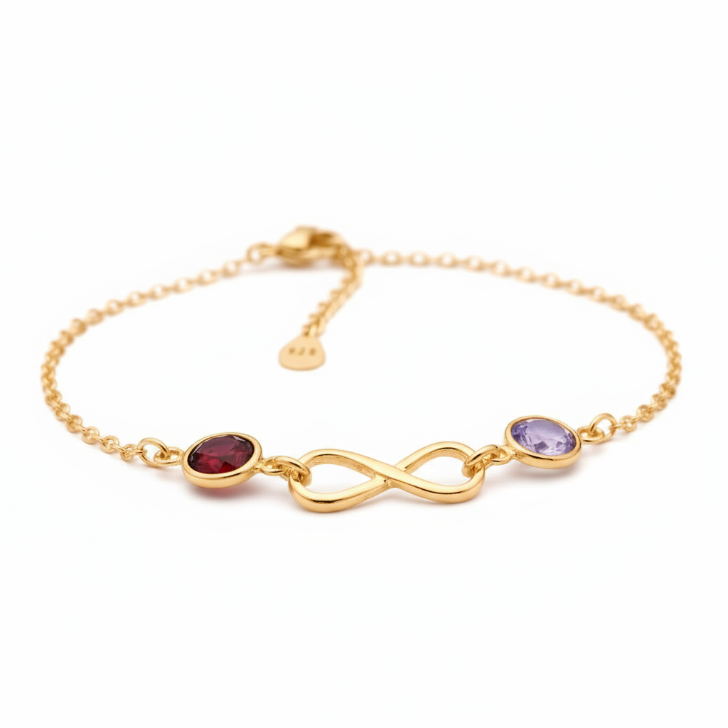 Gold bracelet with two birthstones in sterling silver, handmade in Ireland by Magpie Gems.