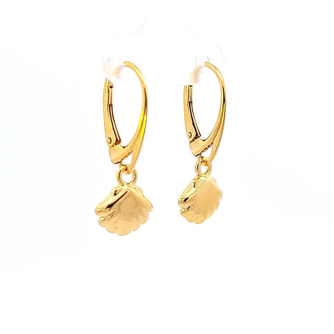 Side view of the intricate details on the 24k gold-plated Shell Dangle & Drop Earrings by Magpie Gems.