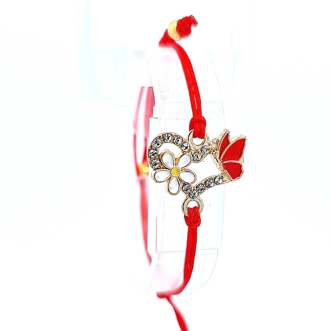 Spring Harmony' Martisor Bracelet displayed on a clear stand, focusing on the heart, flower, and butterfly charms against a pure white backdrop, illustrating the intricate design and sparkling crystals. Adjustable friendship bracelet handmade in Ireland.
