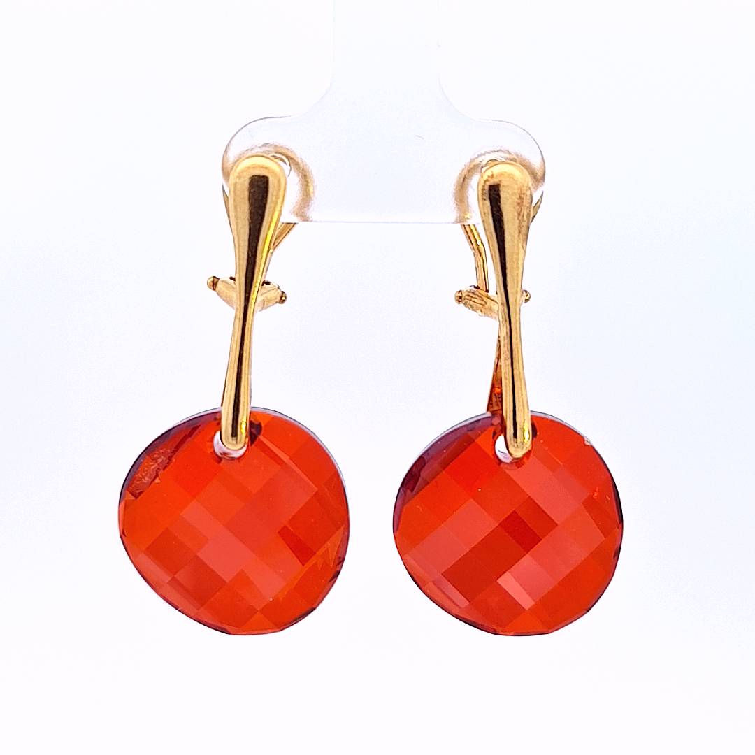 Crimson Cascade Gold Twist Clip-On Earrings with vibrant Red Magma Austrian crystals - front view.