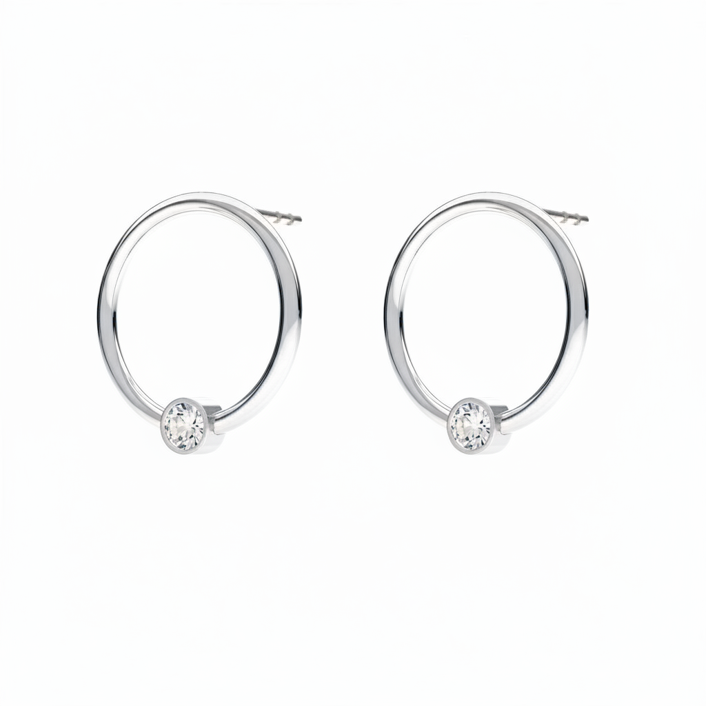 April birthstone circle earrings in sterling silver with clear Diamond crystal, handcrafted by Magpie Gems Ireland