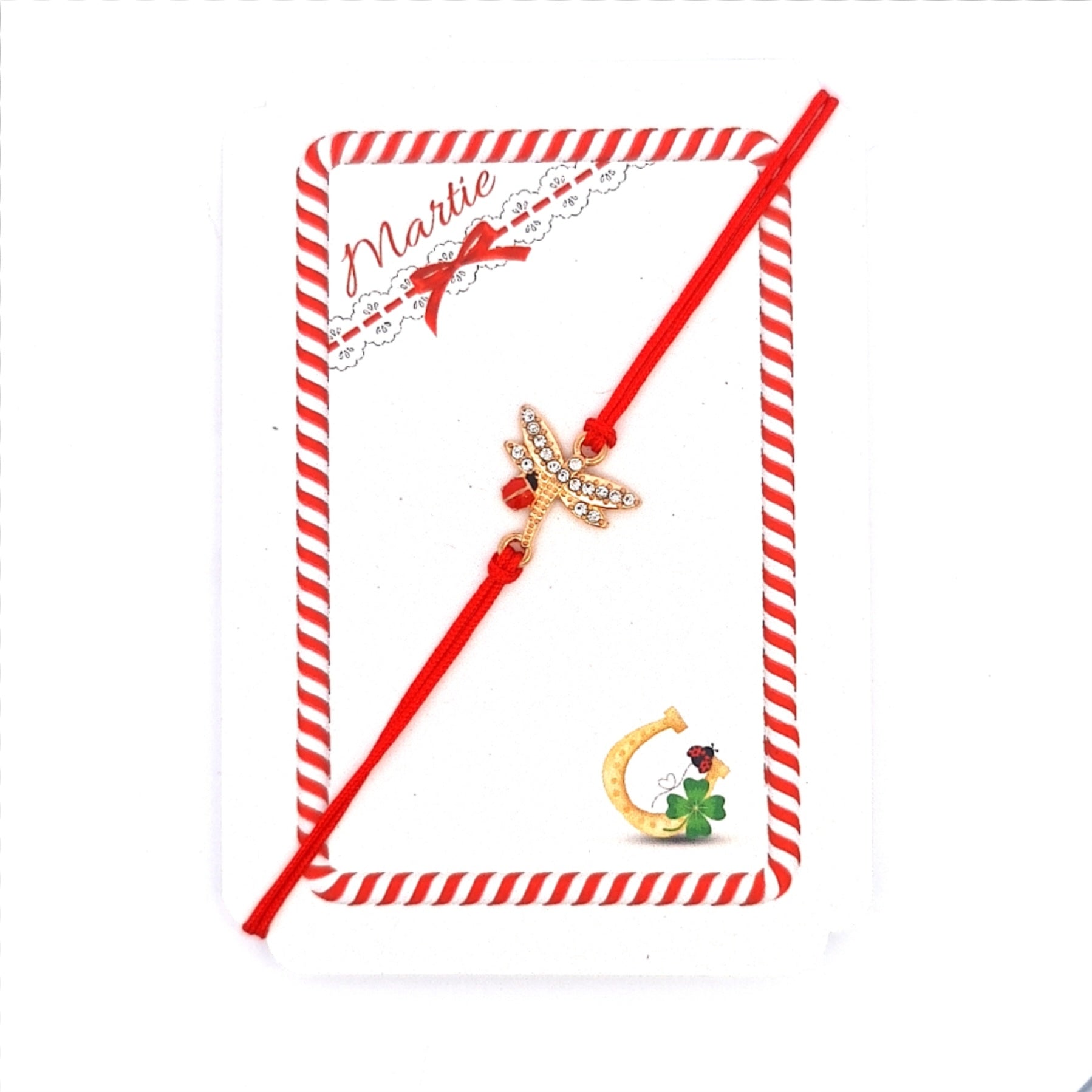 Gold dragonfly Mărțișor bracelet on red thread, with lucky horseshoe, clover and ladybird illustration on the card.