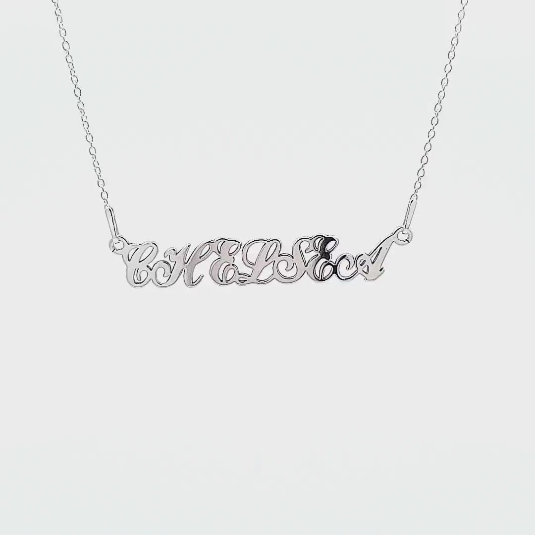 Showcase Video of Magpie Gems Cursive Elegance Name Necklace Featuring Sterling Silver Craftsmanship and Plating Options, with all-capital letters