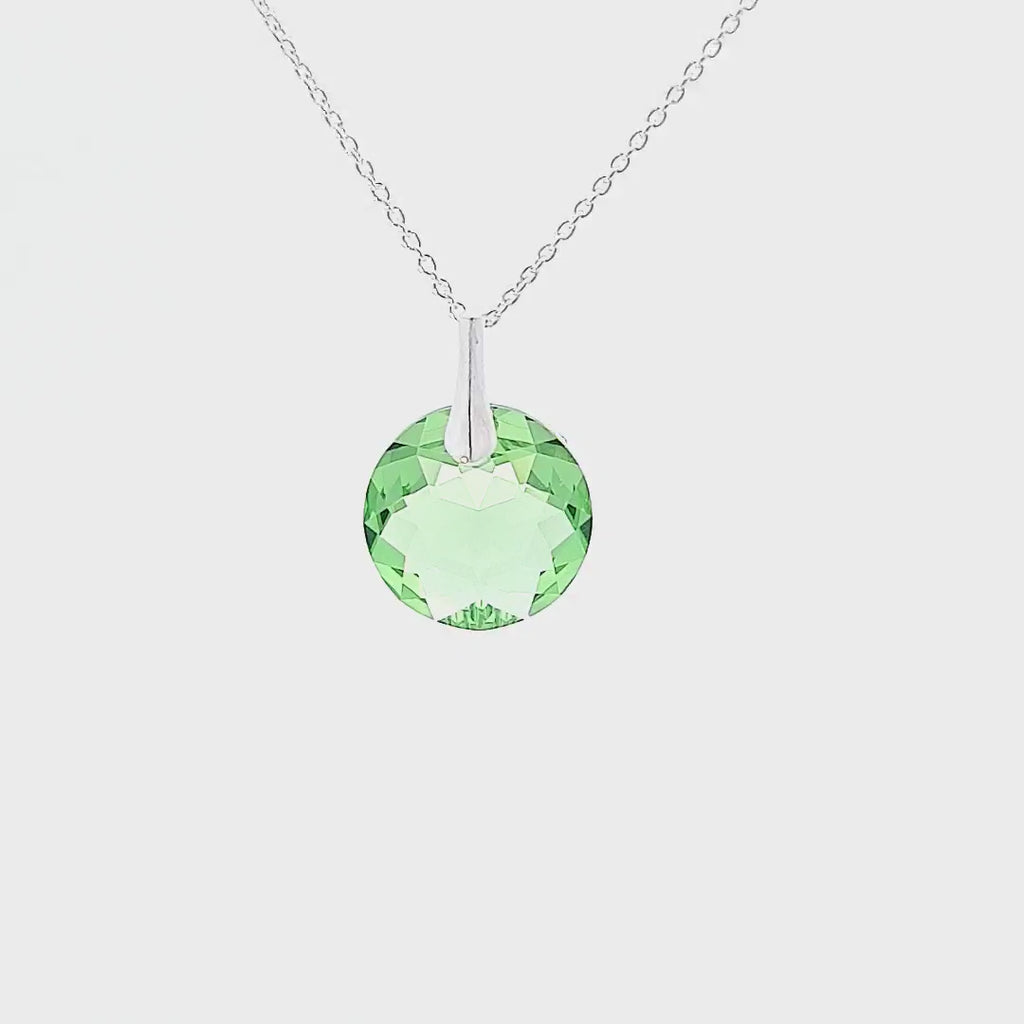 360-degree view of the August Peridot Lime Green Round Birthstone Crystal Pendant Necklace, a symbol of personal journeys