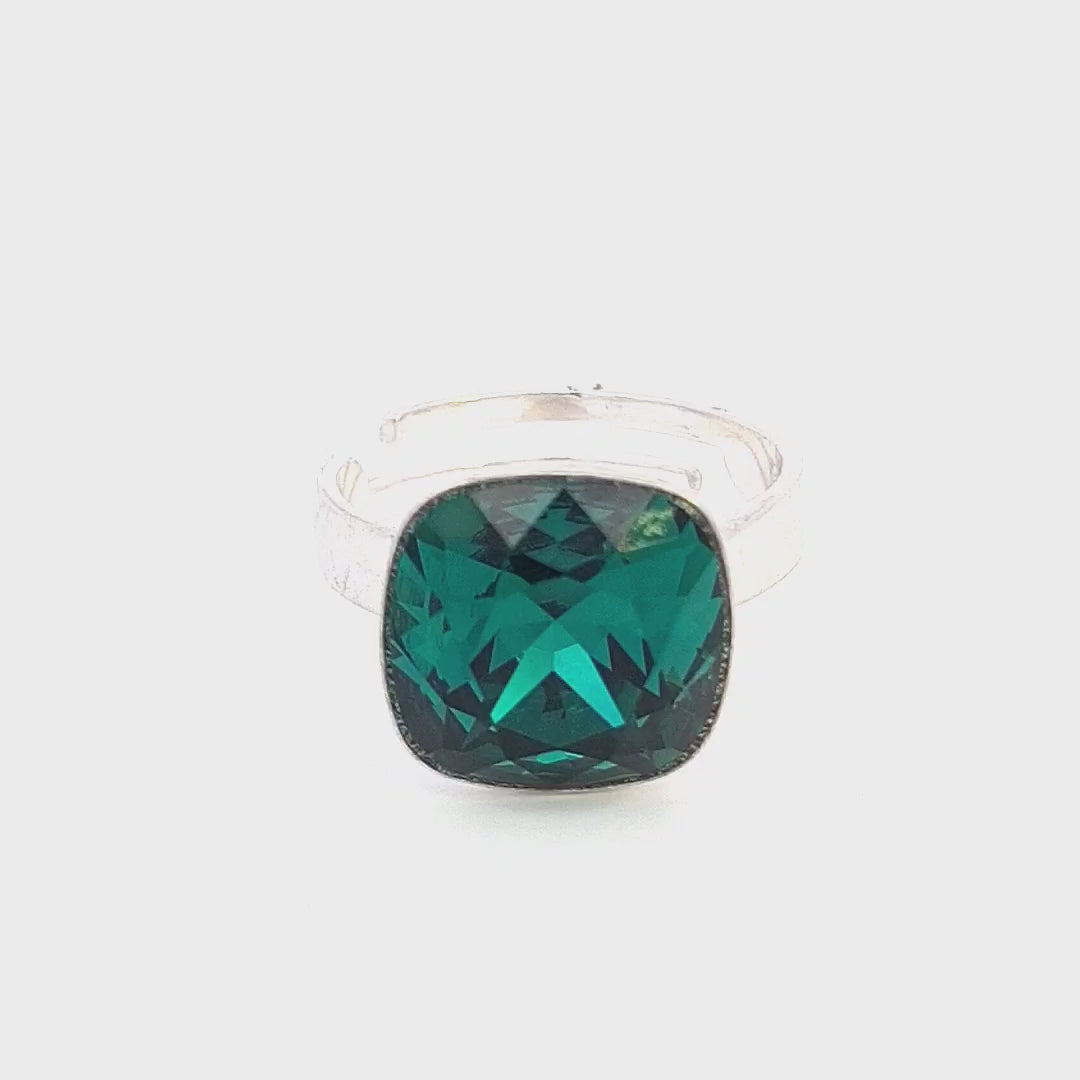 A journey through the lush elegance of the Magpie Gems Luminara Cushion Ring in Emerald Green, a cocktail ring for women.