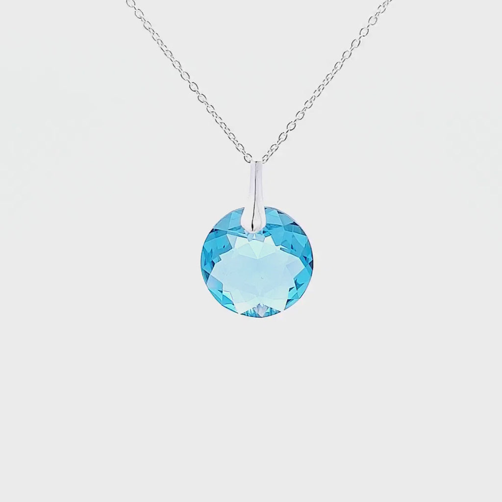 360-degree view of the March Aquamarine Round Birthstone Crystal Pendant Necklace, a symbol of personal journeys.