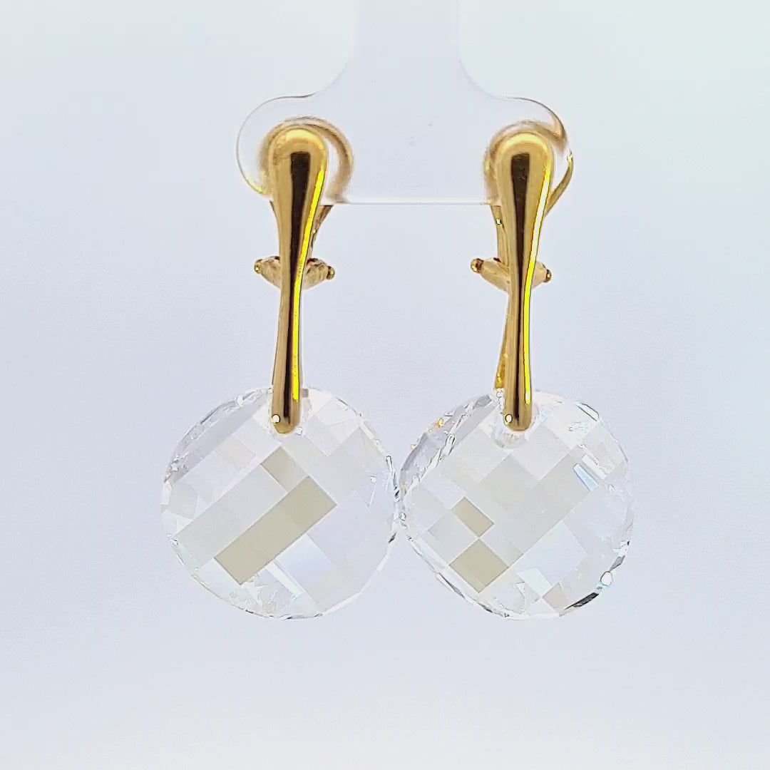 Video revealing the subtle shimmer of the Celestial Gleam Gold Twist Clip-On Earrings with Moonlight Austrian crystals.