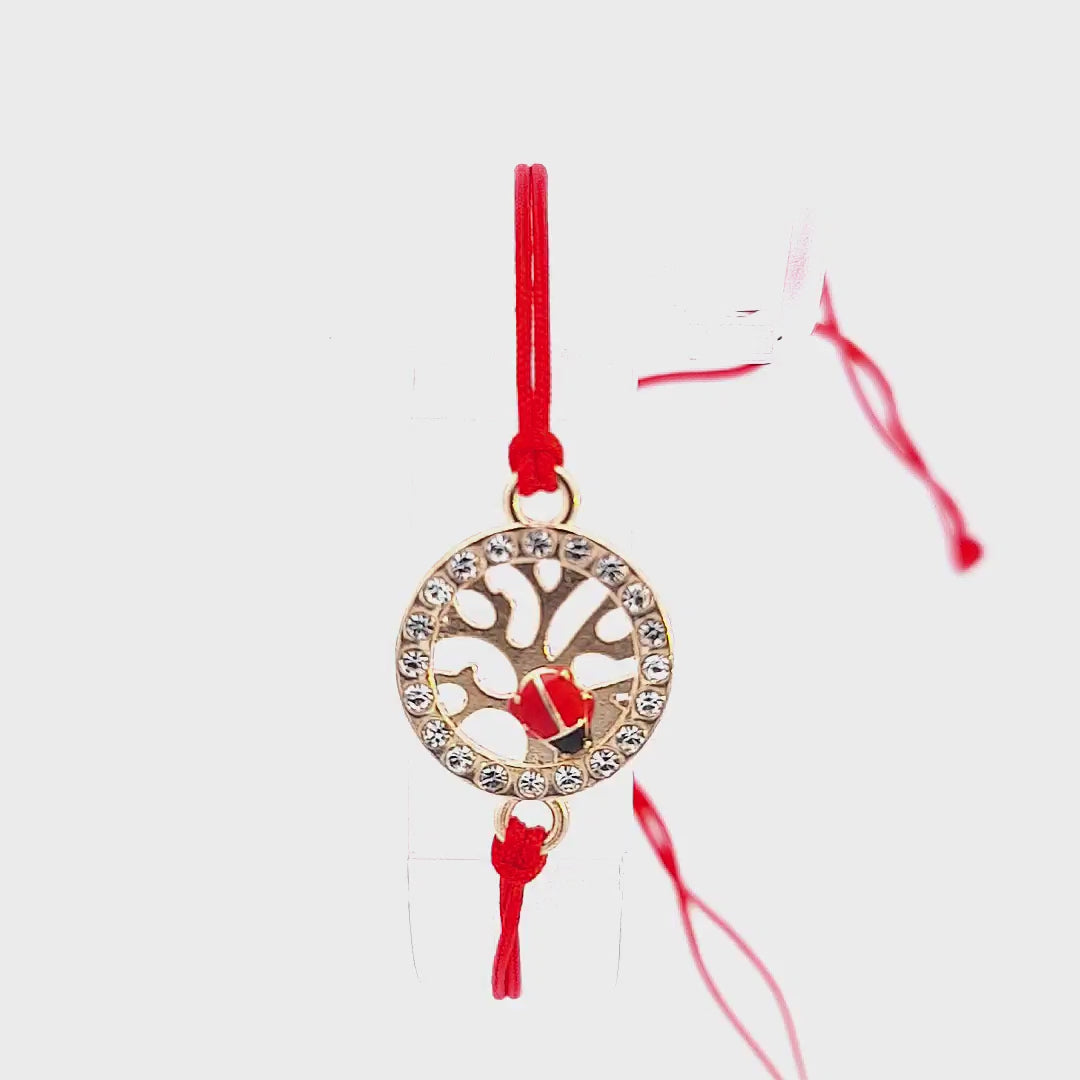 Engaging video displaying the 'Vitality Spark' Martisor Bracelet, focusing on the adjustable feature of the red macramé cord and the detailed Tree of Life char with delicate ladybird. Handmade in Ireland by Magpie Gems