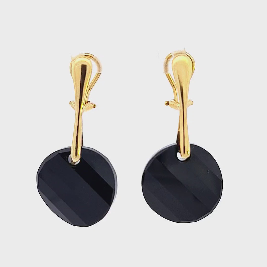 45-degree video demonstration of Midnight Elegance Gold Twist Clip-On Earrings, highlighting the sparkling Jet Black Austrian crystals and the luxurious gold finish.