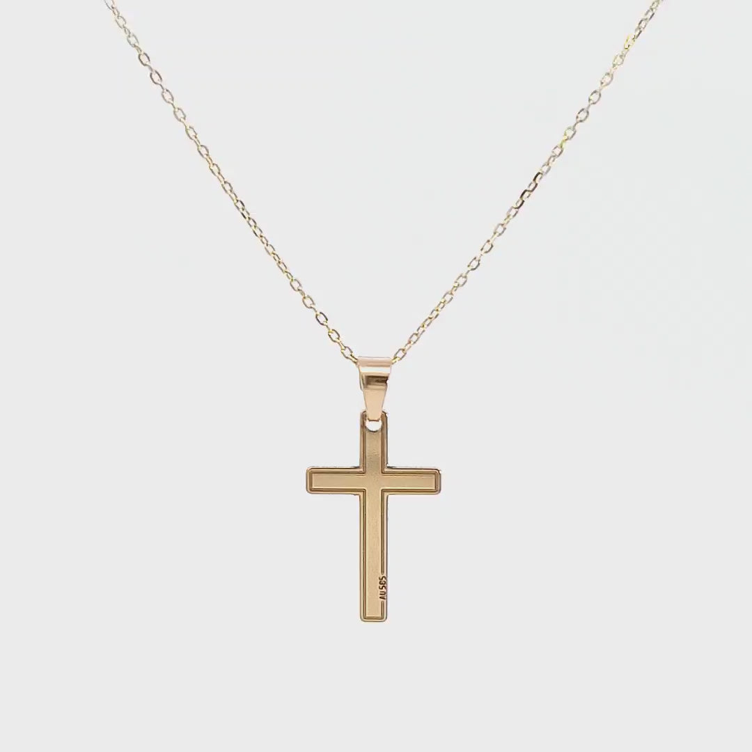 Rotating view of Faith's 14k Gold Cross Necklace - A 45-degree showcase video capturing the radiant beauty and fine craftsmanship of the gold cross pendant.