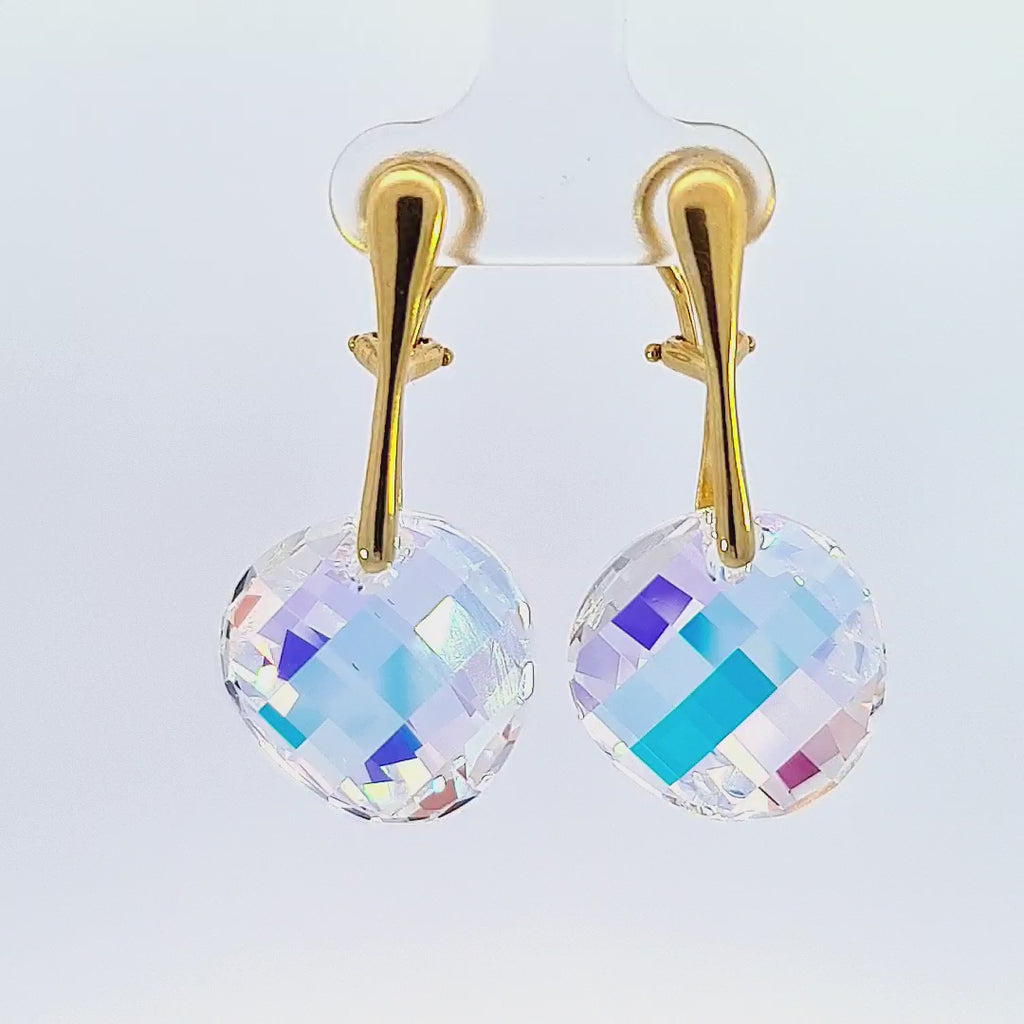 Interactive video displaying Luminous Radiance Gold Twist Clip-On Earrings, highlighting the Aurora Borealis effect of the Austrian Crystal AB.