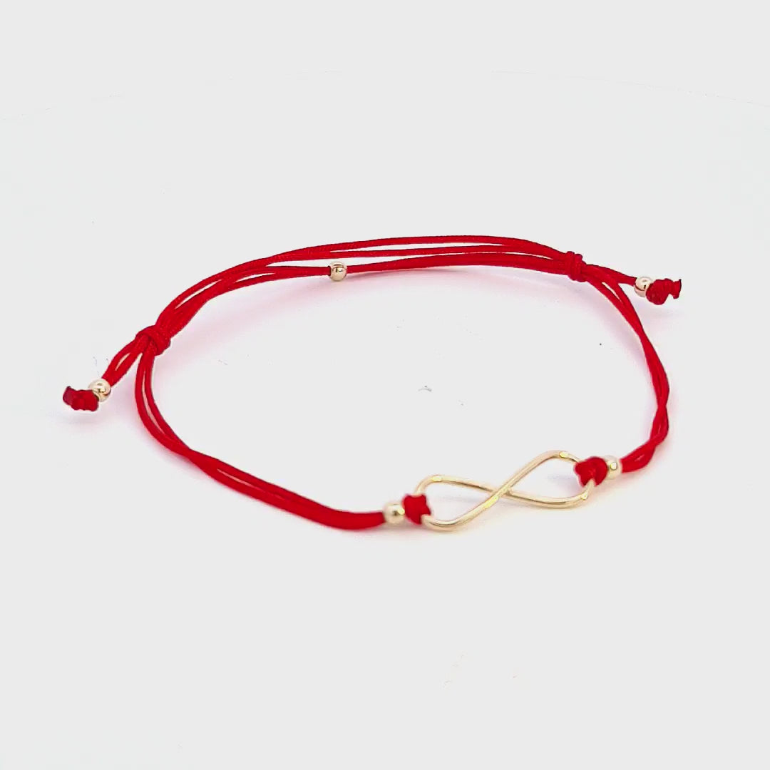 The Infinite Bonds Red String Bracelet elegantly worn on the wrist, emphasising its versatility and the symbolism of infinity.