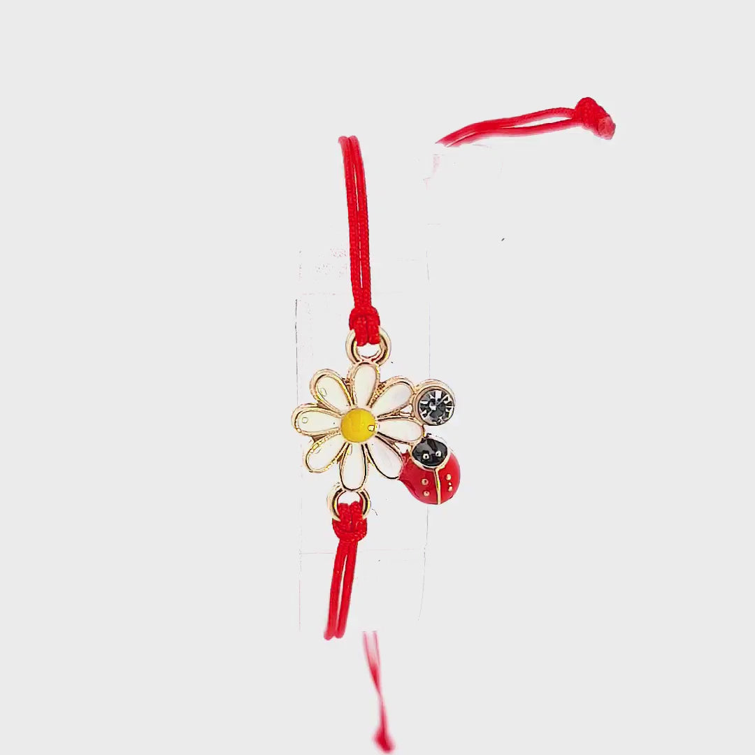 Thumbnail of video featuring the Flower and Ladybird Martisor Bracelet, showing the bracelet's movement and the shimmering crystal.