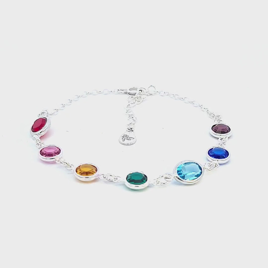 A beautiful Rainbow of Hope Crystal Silver Bracelet featuring seven vibrant crystals in various colors, symbolizing positivity and joy. Each crystal shines brightly, creating a spectrum of hope and optimism in this exquisite piece of jewelry from Magpie Gems Ireland.