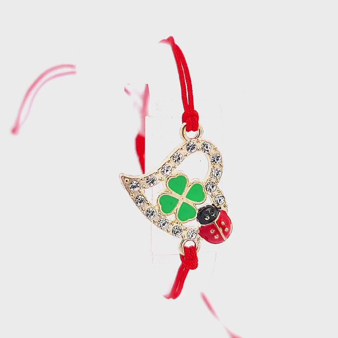 Video showcasing the 'Luck and Love' Martisor Bracelet, with a focus on the intricate details of the heart charm and the easy-to-adjust slip knot on the red cord.